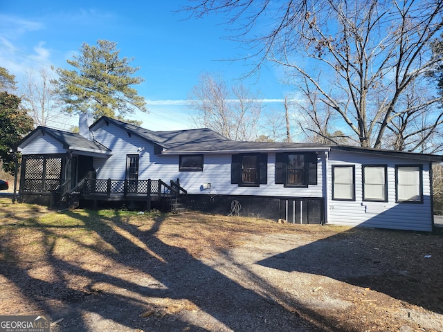 view of front of home featuring a deck