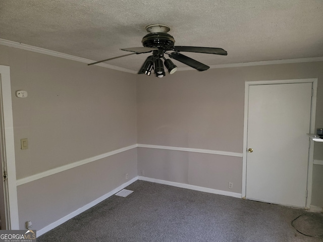 unfurnished room featuring crown molding, ceiling fan, and carpet