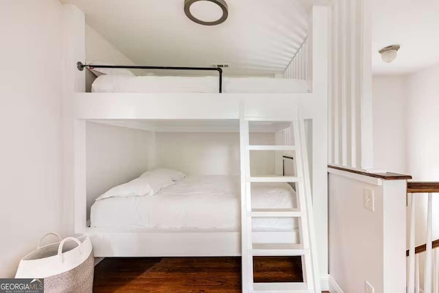 bedroom featuring hardwood / wood-style flooring