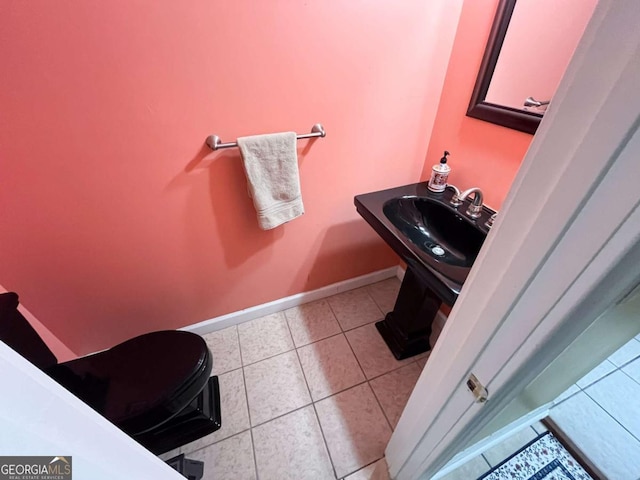 bathroom featuring sink and tile patterned floors