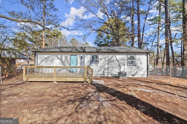 rear view of property with a deck