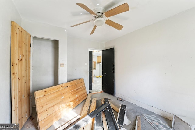 interior space featuring ceiling fan