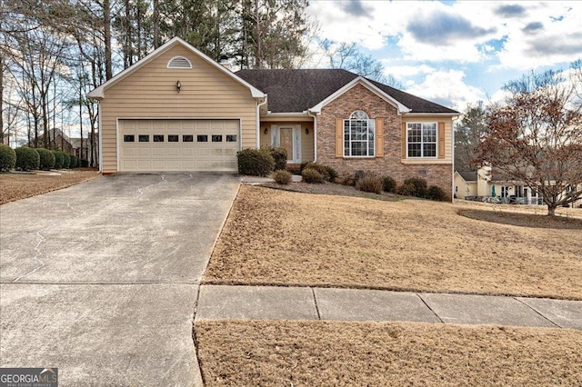 ranch-style home featuring a garage