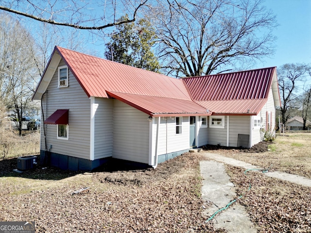 view of front of property with cooling unit