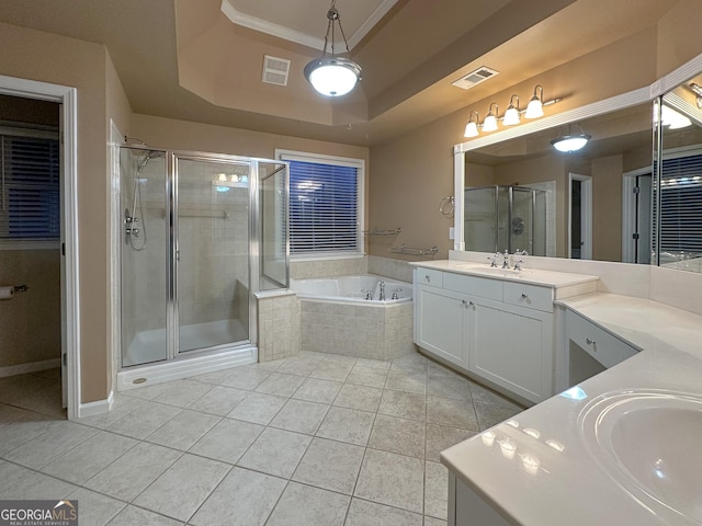 bathroom featuring vanity, plus walk in shower, tile patterned floors, and a tray ceiling