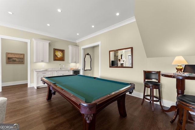 playroom with billiards, ornamental molding, dark hardwood / wood-style floors, and indoor bar