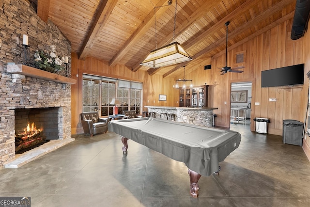 rec room with high vaulted ceiling, wooden walls, wood ceiling, and beam ceiling