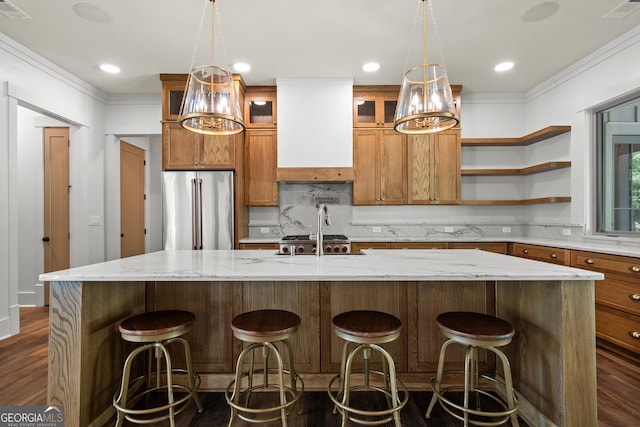 kitchen featuring a kitchen island with sink, high end fridge, open shelves, and glass insert cabinets