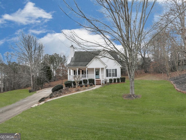 cape cod-style house with a front yard and a porch