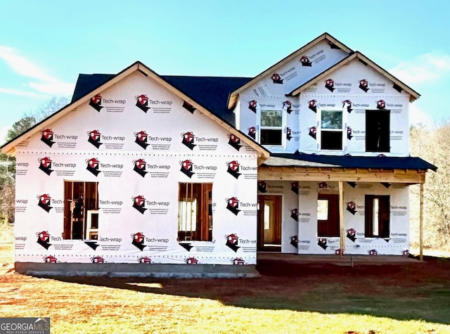 property in mid-construction featuring a porch