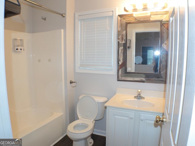 full bathroom featuring vanity, shower / tub combination, and toilet