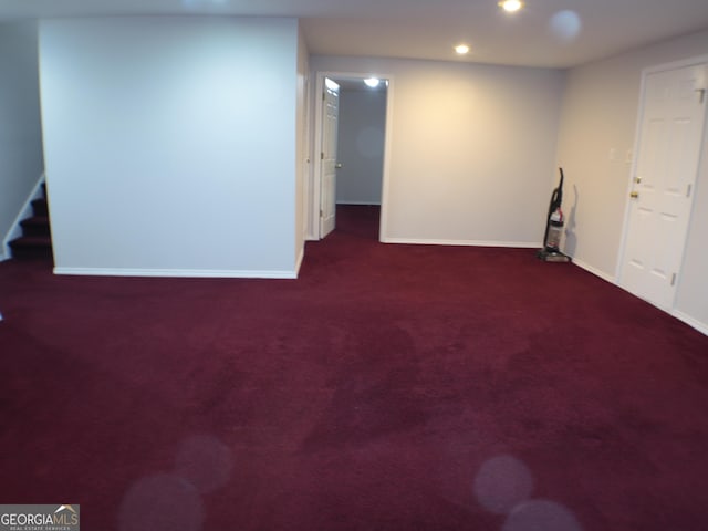 basement with dark carpet