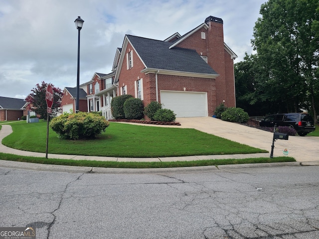 view of home's exterior with a yard and a garage