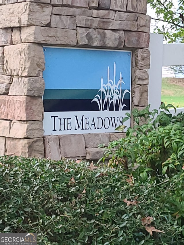 view of community sign