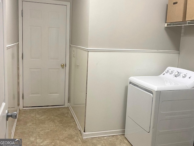 laundry area featuring washer / dryer and laundry area