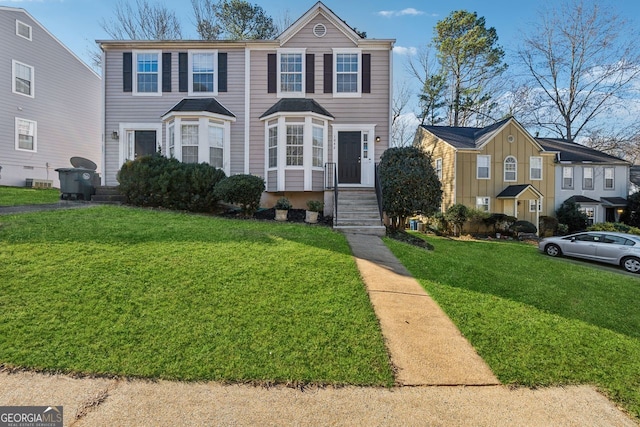 view of front facade with a front lawn