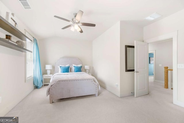 carpeted bedroom with lofted ceiling and ceiling fan