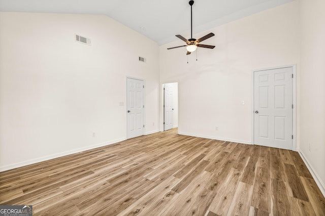 588 S Broad St, Toccoa, GA 30577 - unfurnished living room with a ceiling fan, high vaulted ceiling, and light wood finished floors