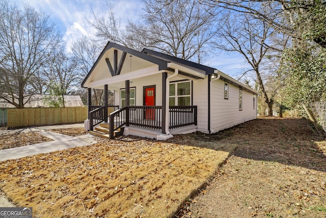 ranch-style house with covered porch