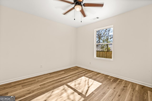 588 S Broad St, Toccoa, GA 30577 - unfurnished room with wood finished floors and a ceiling fan