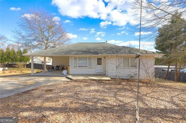 view of front facade with a carport