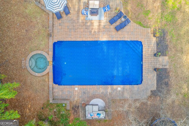 view of pool with a patio