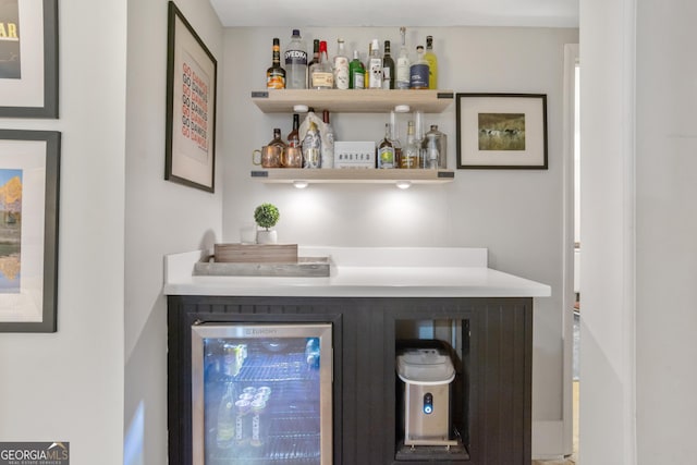 bar with beverage cooler and a dry bar