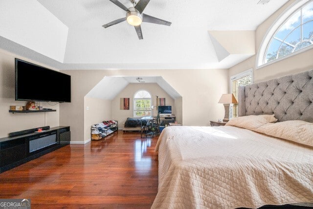 bedroom featuring dark wood-type flooring and ceiling fan