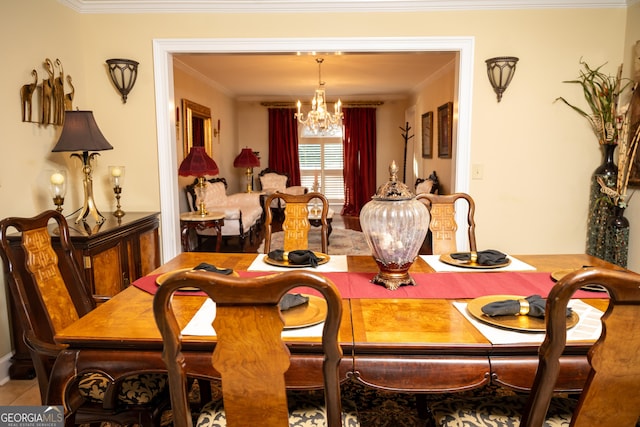 dining space with crown molding and a notable chandelier