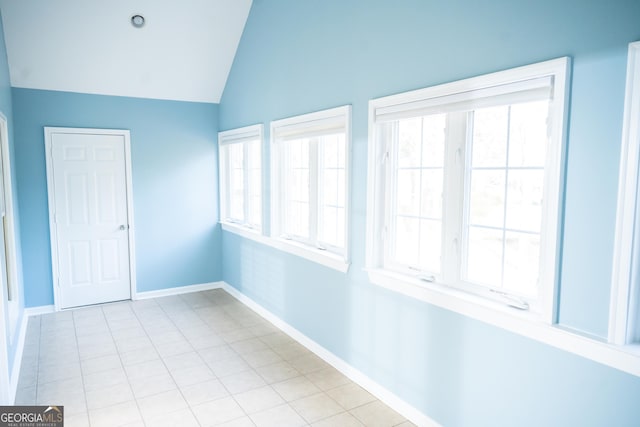 unfurnished sunroom featuring lofted ceiling