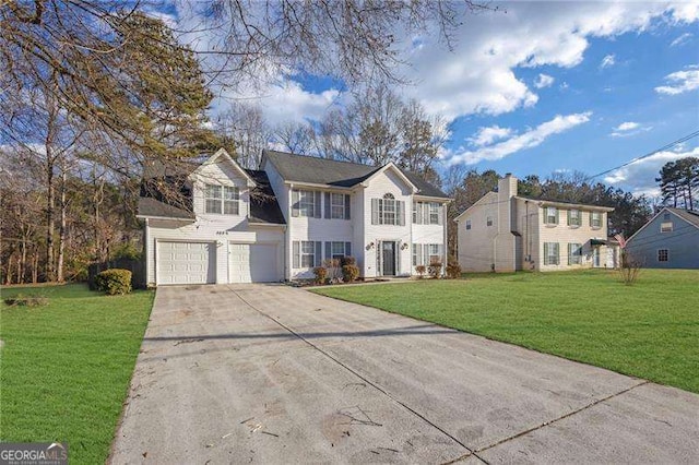 front facade with a garage and a front lawn