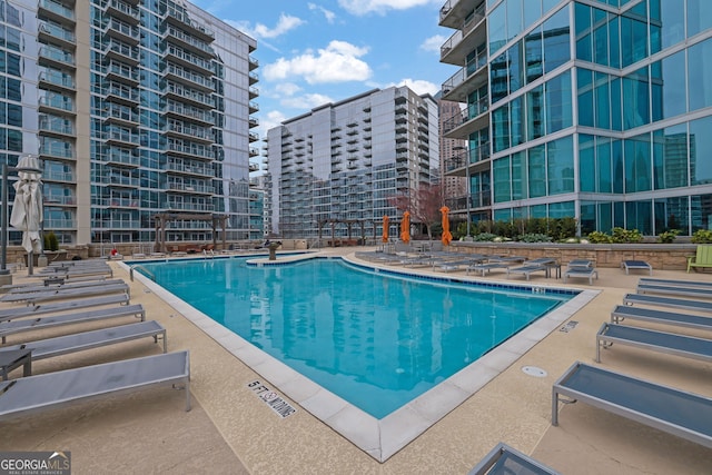1080 Peachtree St NE Unit 804, Atlanta, GA 30309 - community pool featuring a patio
