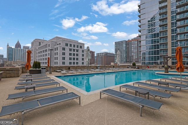 view of pool featuring a patio area