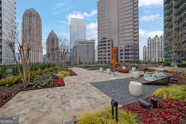 surrounding community with a patio area