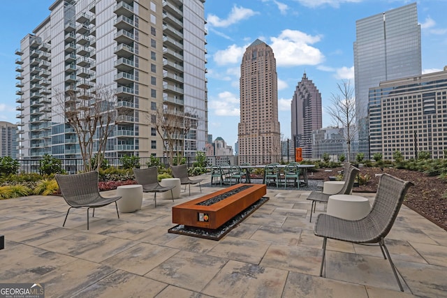 view of patio featuring a fire pit