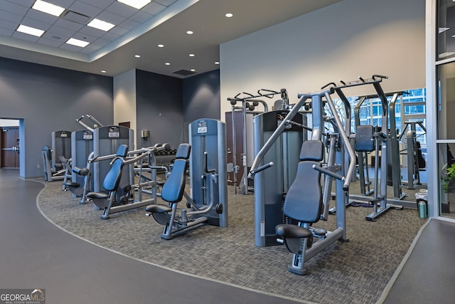1080 Peachtree St NE Unit 804, Atlanta, GA 30309 - gym with a paneled ceiling, carpet floors, and recessed lighting