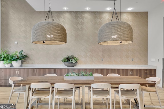 dining room with light hardwood / wood-style flooring