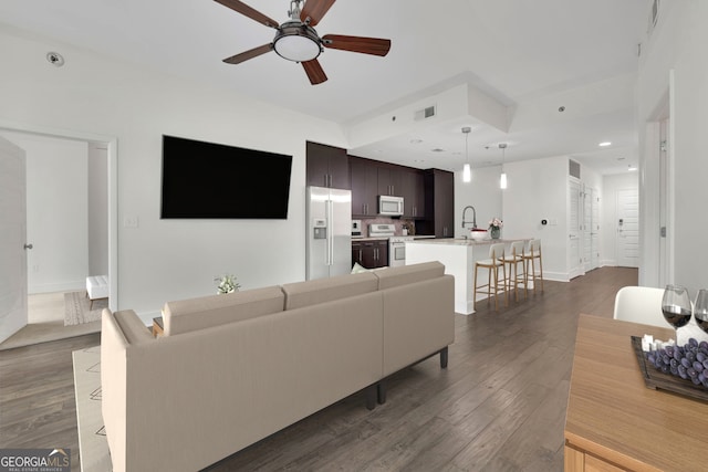 1080 Peachtree St NE Unit 804, Atlanta, GA 30309 - living area with visible vents, baseboards, a ceiling fan, recessed lighting, and dark wood-type flooring
