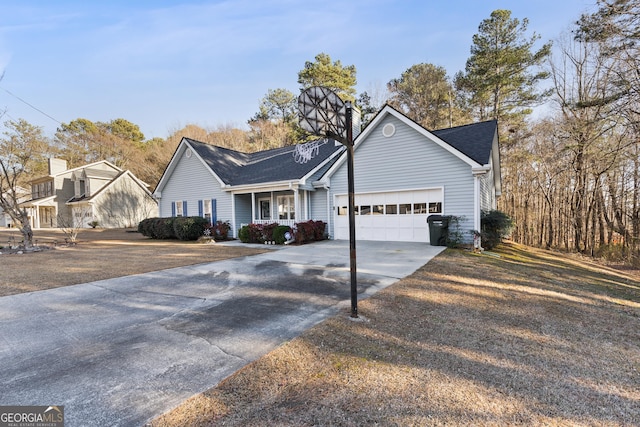 view of front facade with a garage and covered porch