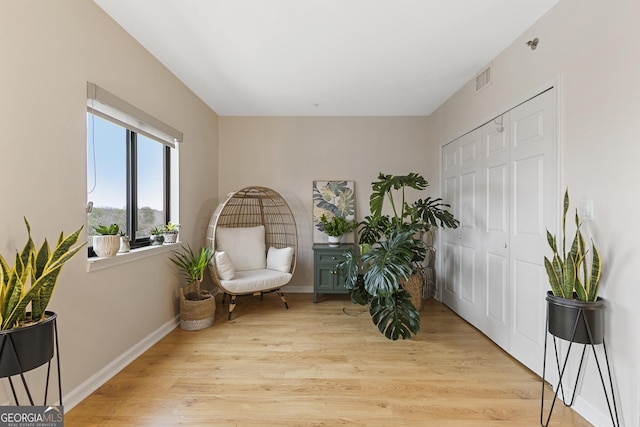 living area with light wood-type flooring