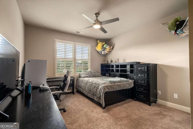 109 Slate Dr, Buford, GA 30518 - bedroom with light colored carpet, an office area, ceiling fan, and baseboards