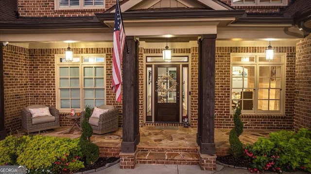 109 Slate Dr, Buford, GA 30518 - view of exterior entry featuring brick siding and covered porch
