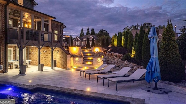 109 Slate Dr, Buford, GA 30518 - swimming pool featuring a fire pit and a patio area
