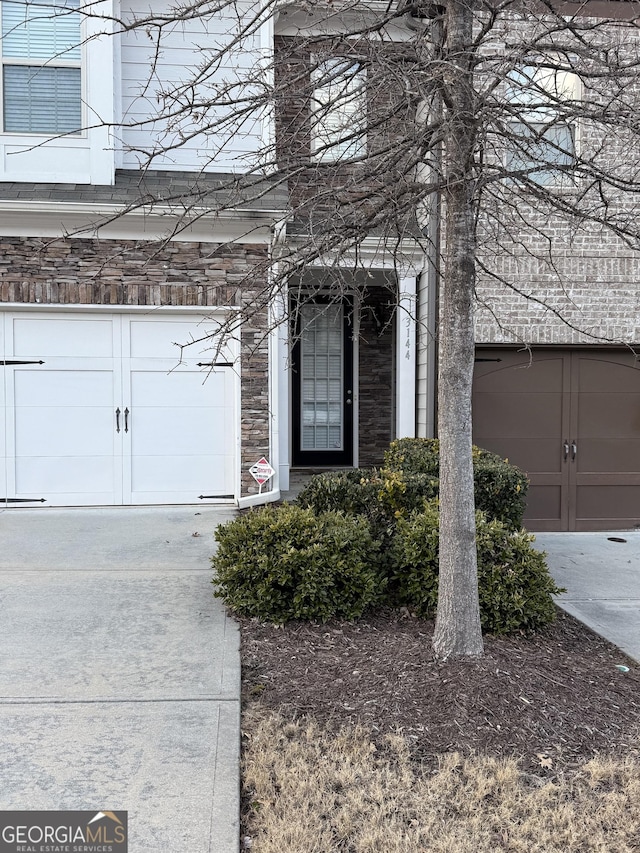 property entrance with a garage