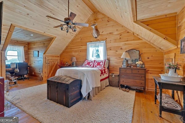 bedroom with wooden ceiling, light hardwood / wood-style floors, and ceiling fan