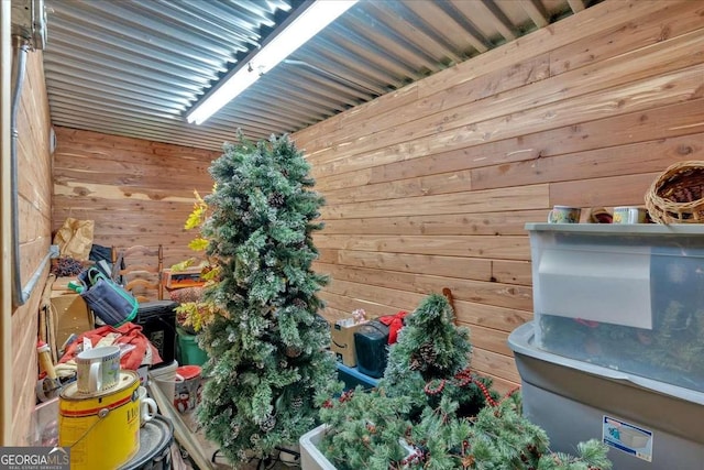 interior space featuring wooden walls