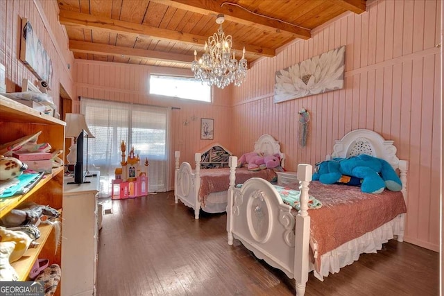 bedroom featuring beamed ceiling, dark hardwood / wood-style flooring, and wooden ceiling