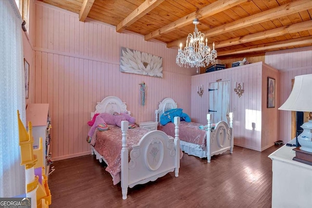 bedroom with beam ceiling, wooden ceiling, dark hardwood / wood-style floors, and a chandelier