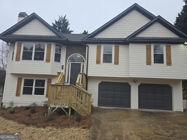 bi-level home featuring a garage