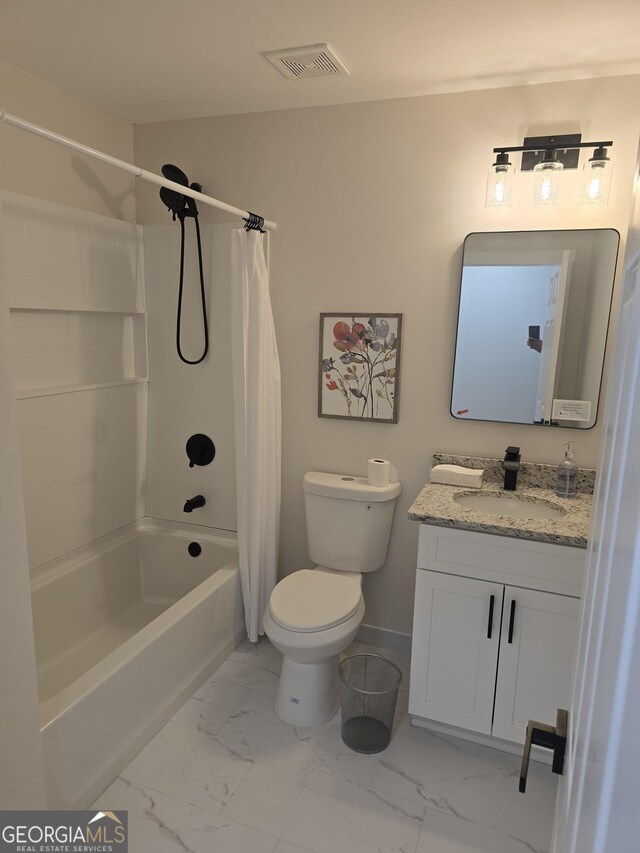 full bathroom with shower / tub combo, vanity, and toilet